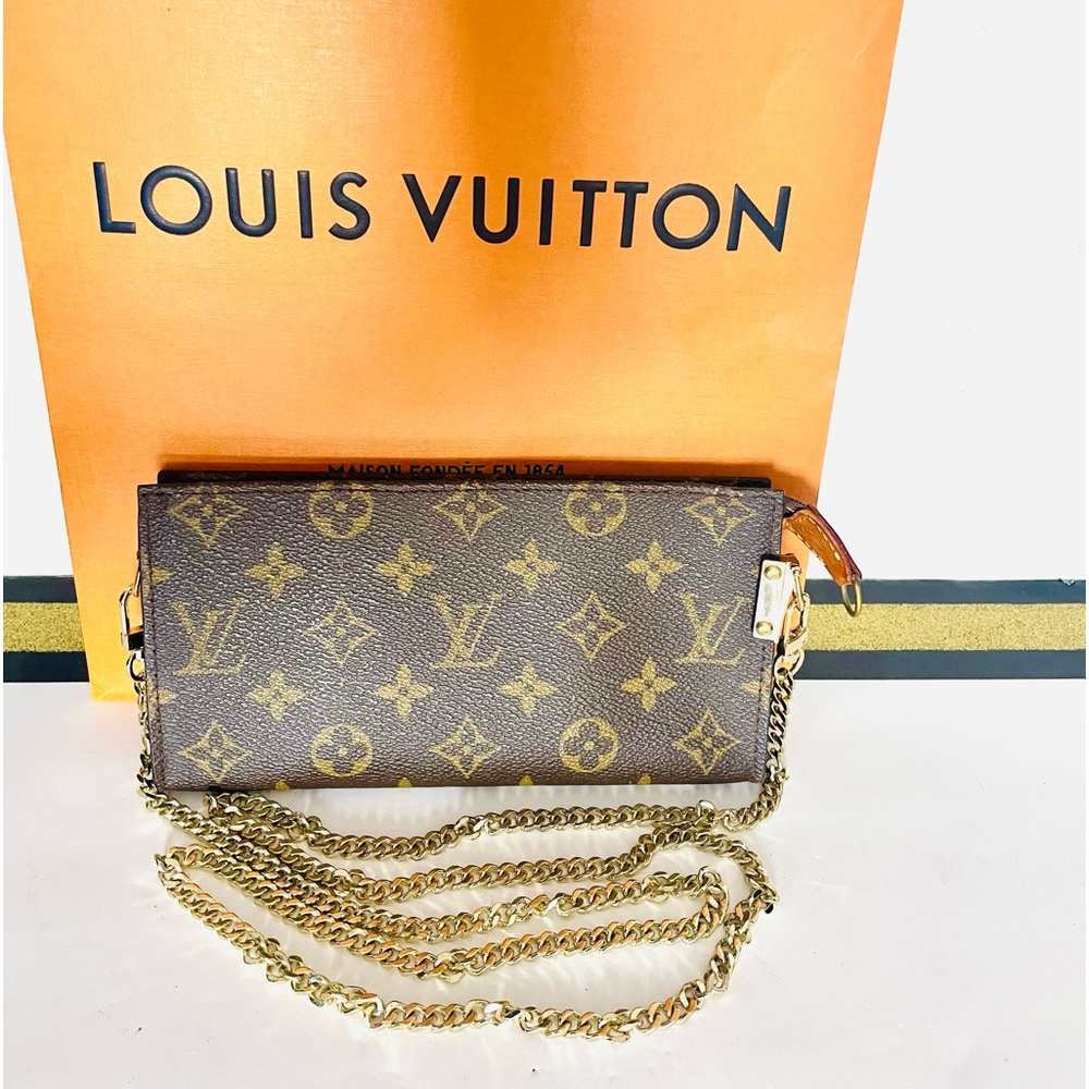 Authentic Louis Vuitton monogram wristlet pouch/ crossbody bag .